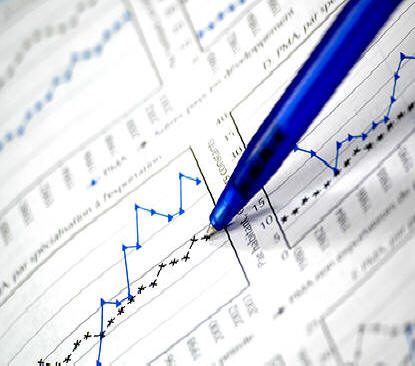 File:Bigstockphoto Photo Showing Stock Chart 1340323.jpg